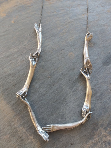 Long Silver Connecting Hands Necklace