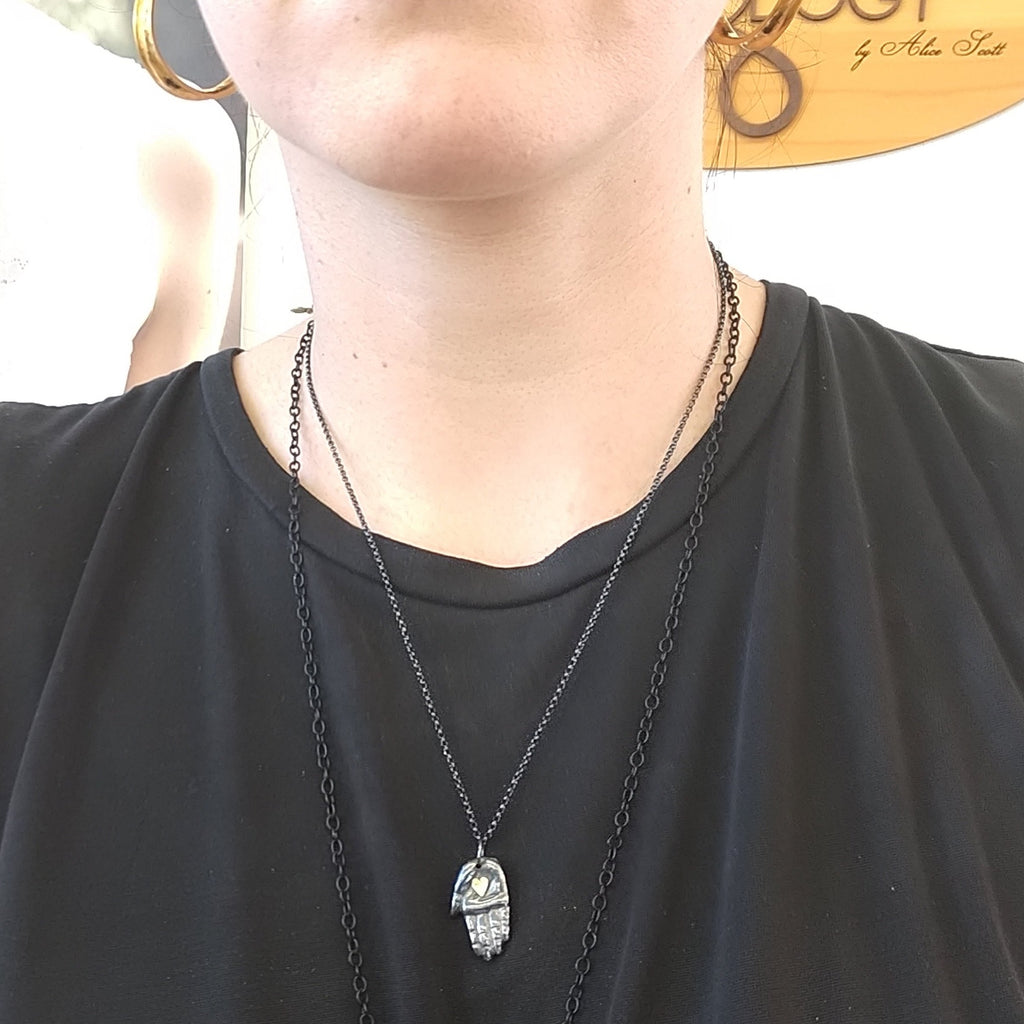 Hand on sales heart necklace